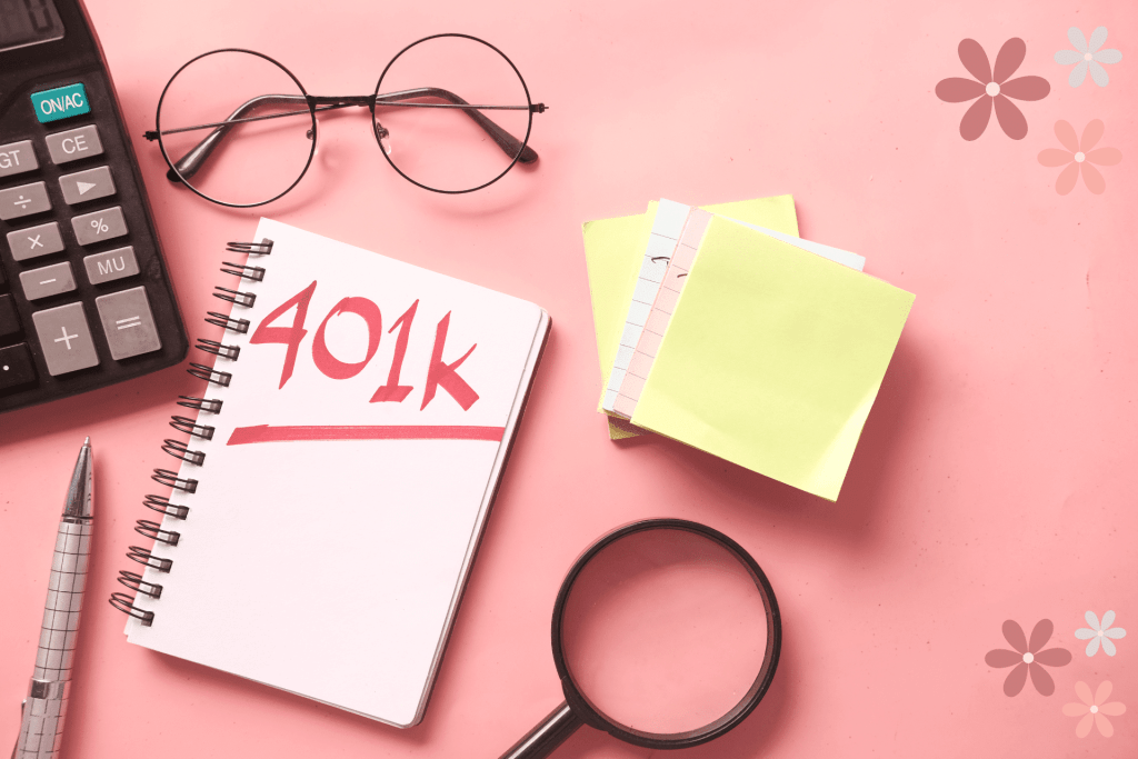 Desk with paper and a notepad that says 401(k) underlined