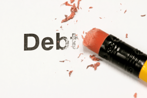 The word "debt" being erased by a pencil