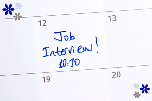 Written on a calendar are the words Job Interview - 10:30
